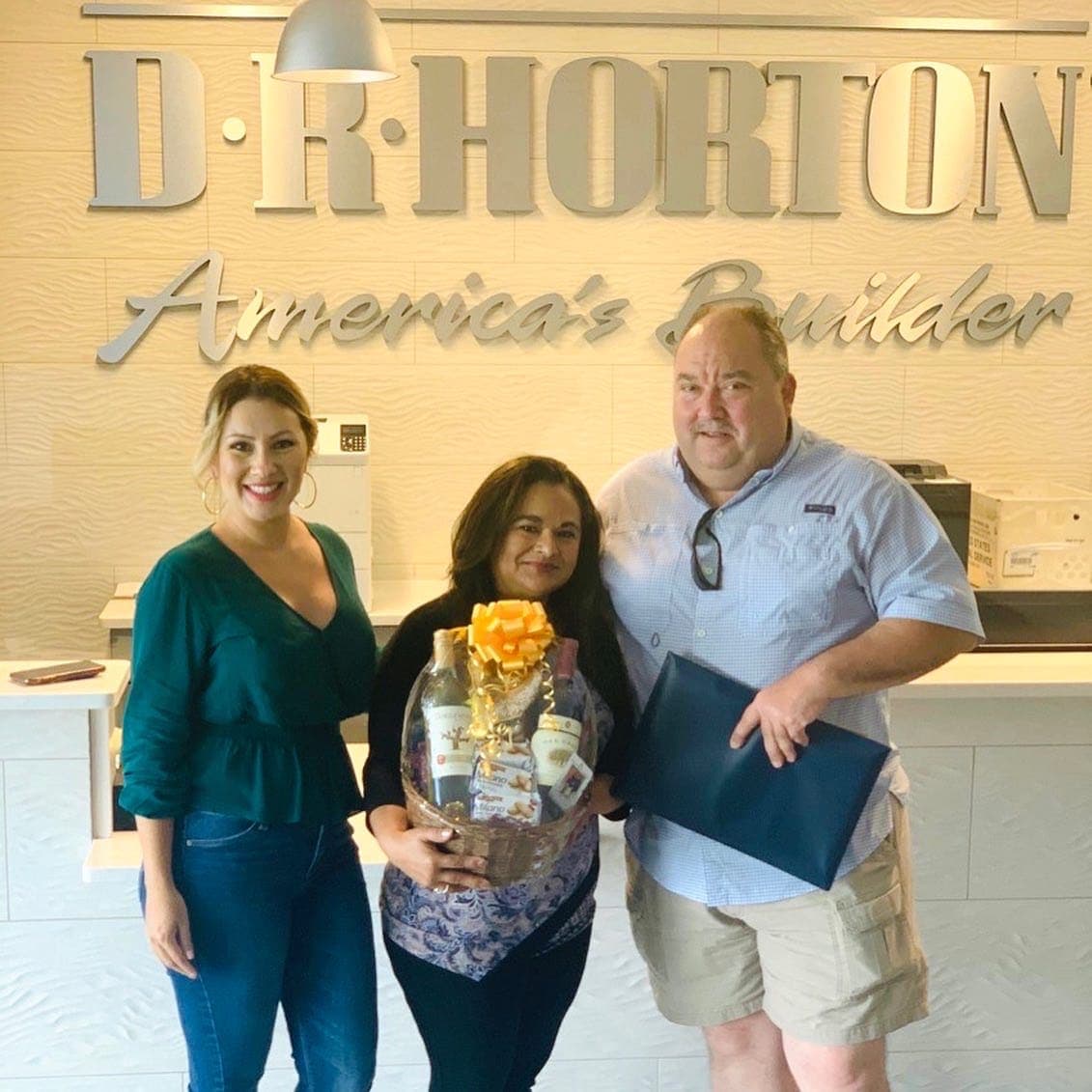 Buyers celebrating the handover of their new construction home in Central Florida