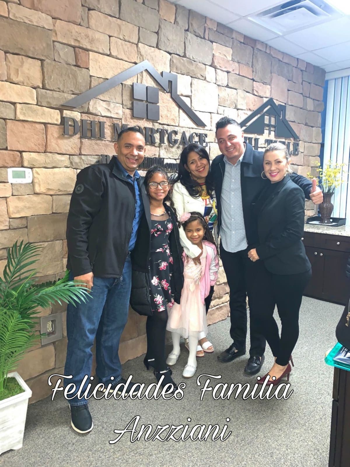 A family receiving the keys to their newly built Central Florida home